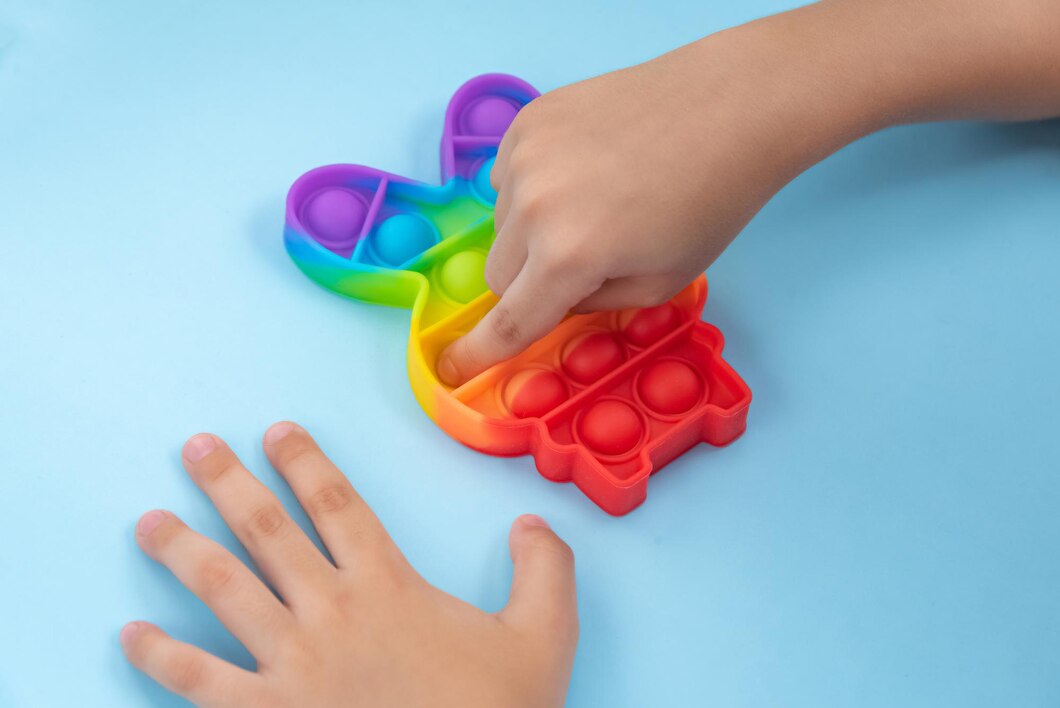 Jak wybrać odpowiednie narzędzia i zabawki do terapii sensorycznej?